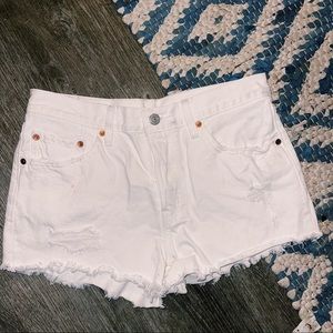 Levi’s white high waisted distressed shorts